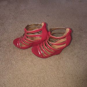 Red with gold trim wedge heels, never worn